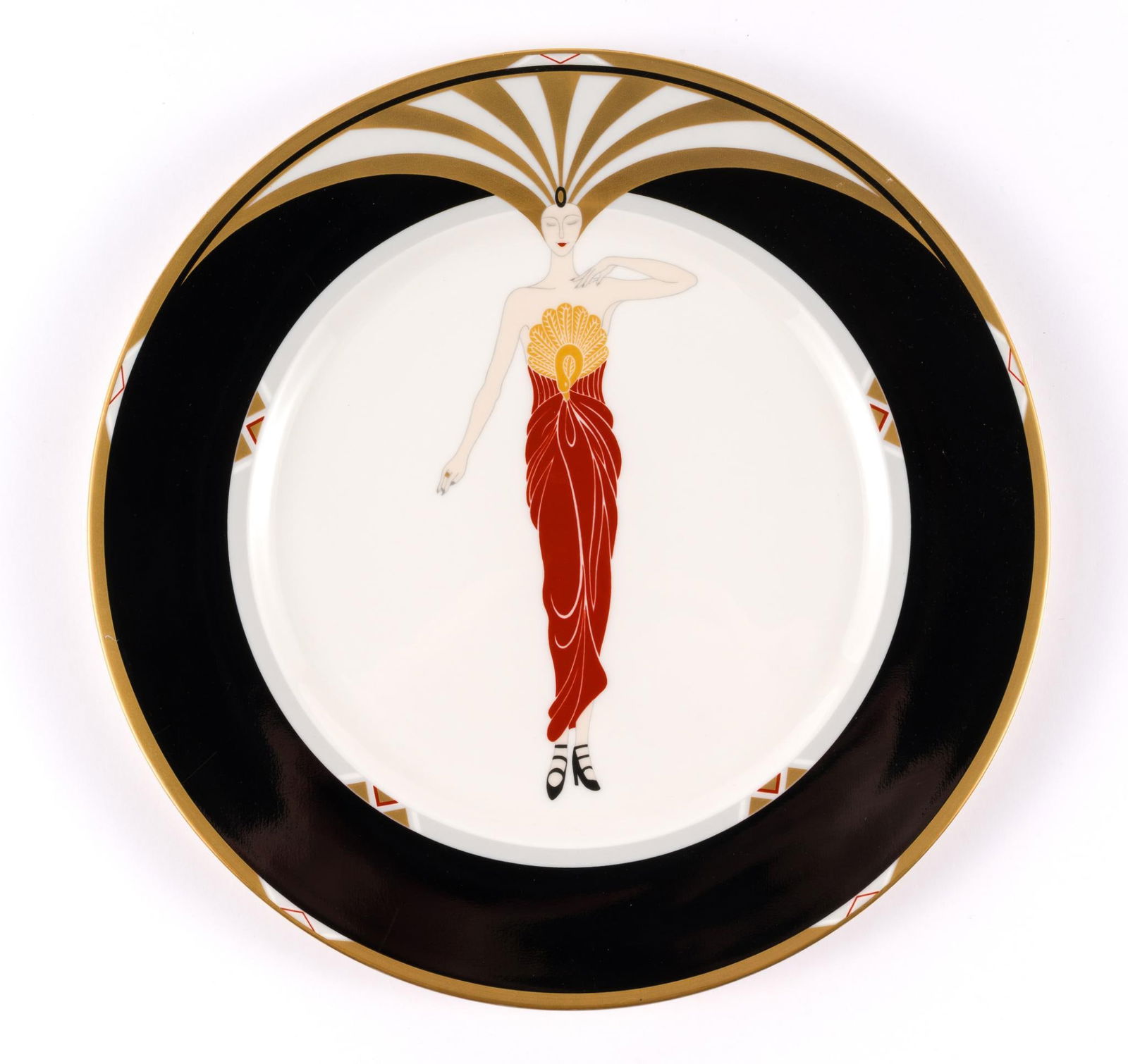 Erte Bone China Plate Le Soleil: NOT ELIGIBLE FOR IN-HOUSE SHIPPING: See Terms for Shipping Options. A 12" diameter porcelain charger. Erté (Romain de Tirtoff) (Russian/French, 1892-1990) Le Soleil, Light scratches but no chips.
