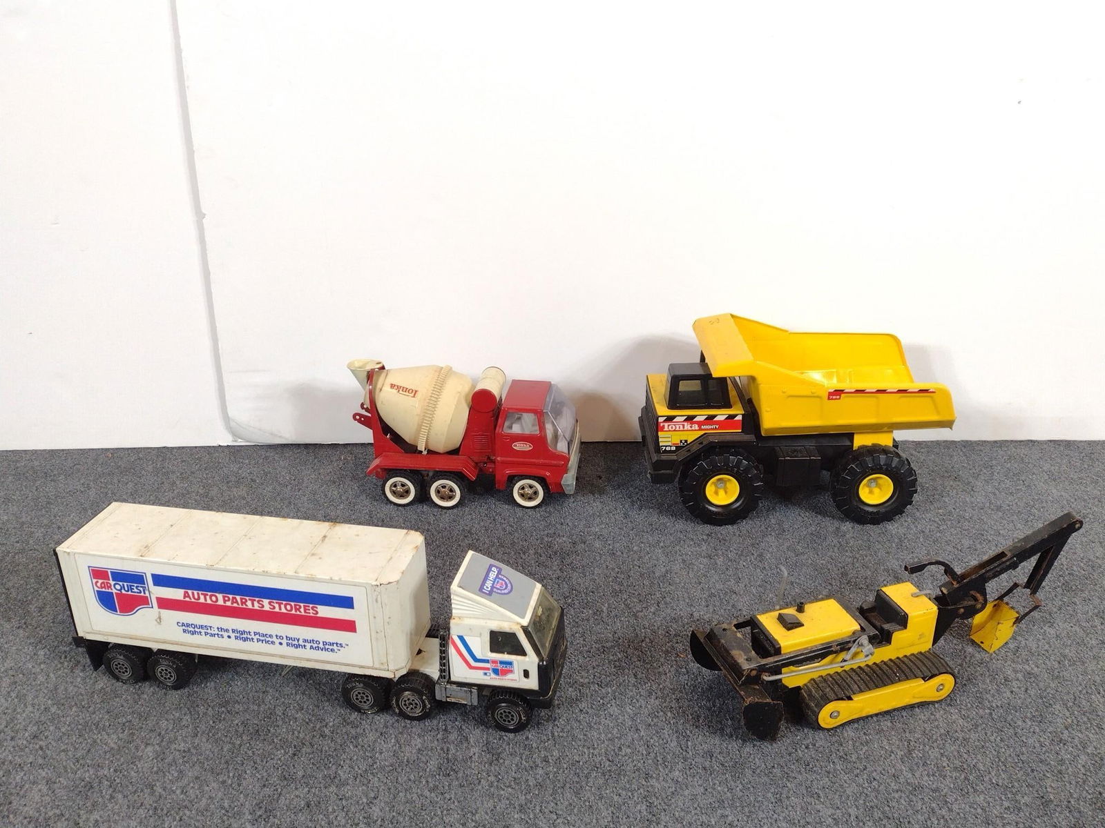 4 Toy Trucks incl. Tonka: 9-3/4" to 25-1/4" long.