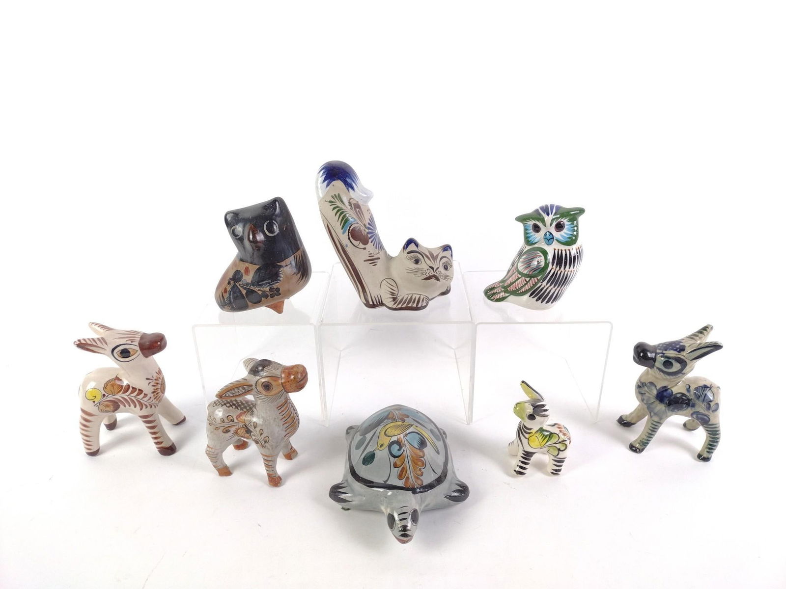 8 Pcs Tonala Mexican Pottery: 2" to 5-1/2" wide x 3-1/4" to 5-1/4" high.