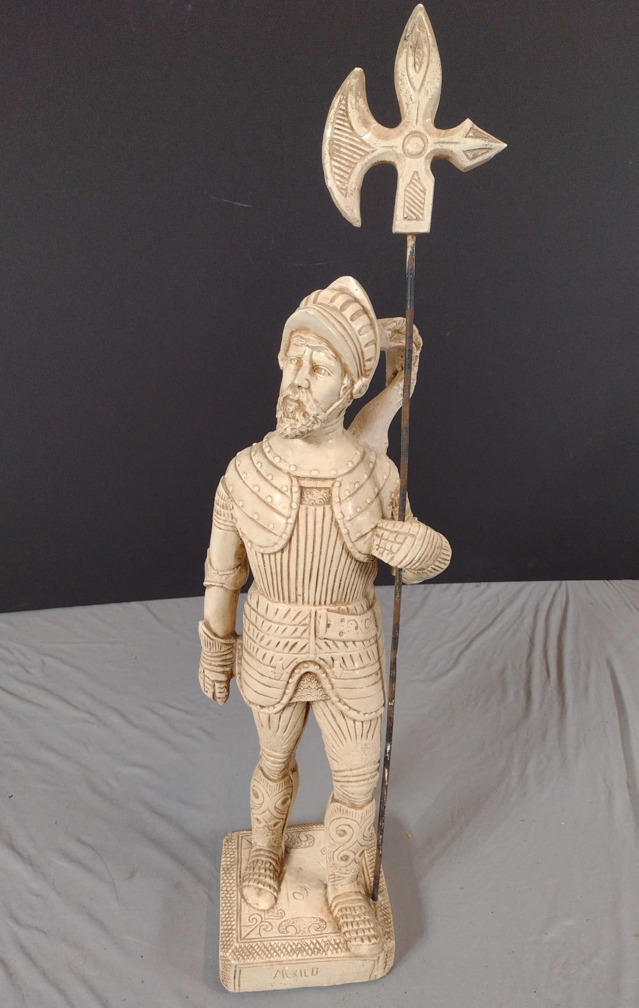 Mexican Statue: NOT ELIGIBLE FOR IN-HOUSE SHIPPING: See Terms for Shipping Options. 8" wide X 8" deep X 38-1/2" high. Axe has repair.
