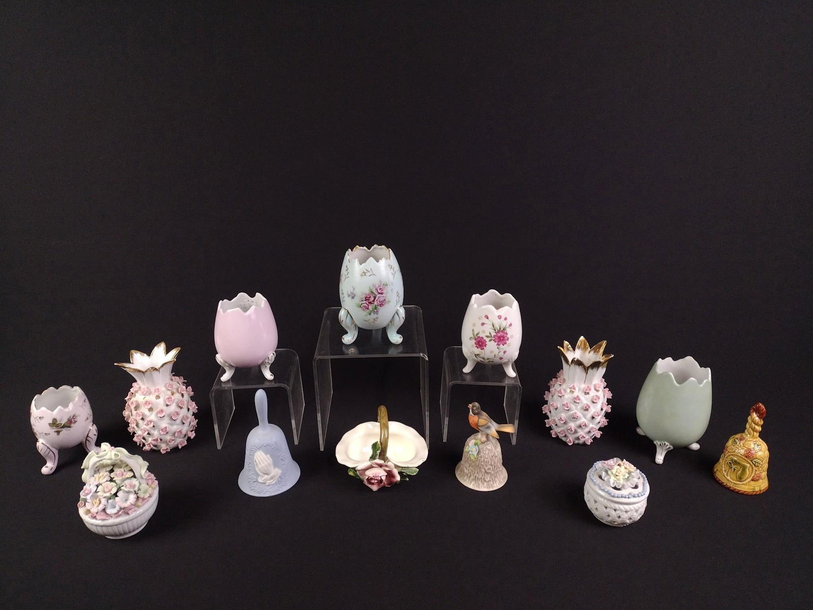 13 Vintage Ceramics Incl Capodimonte: Includes painted egg vases, bells, vases, and baskets. Includes Lefton, Napoware, and Towle. Light chips to florals, but overall excellent condition. 3" to 7" tall.