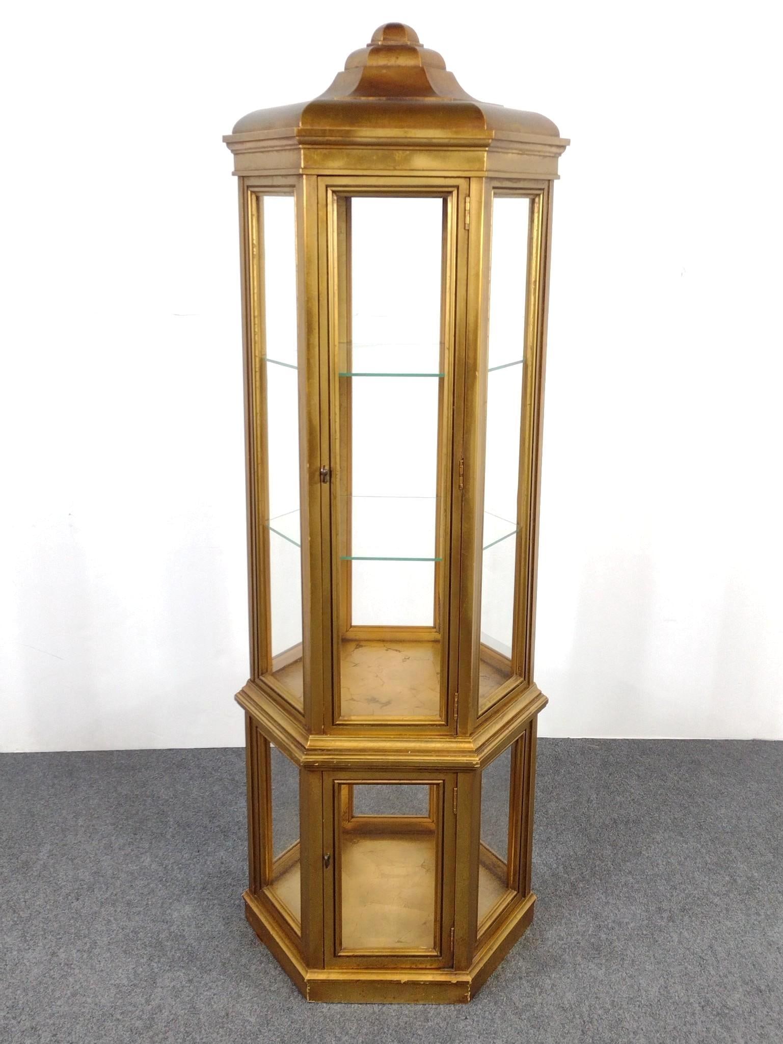 Hexagon Curio Cabinet: NOT ELIGIBLE FOR IN-HOUSE SHIPPING: See Terms for Shipping Options. 24" wide X 21" deep X 73" high. Has some scratches. No manufactures name found.