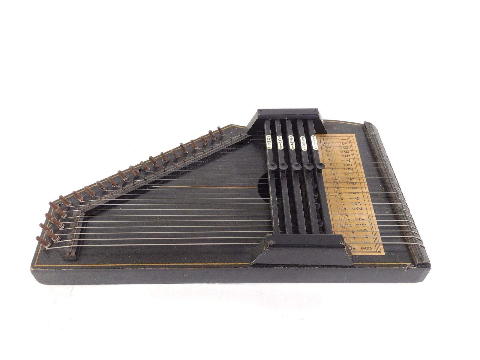 Antique Autoharp: Possibly Oscar Schmidt. 9-3/4" wide x 17-3/4" long x 3-1/4" high.
