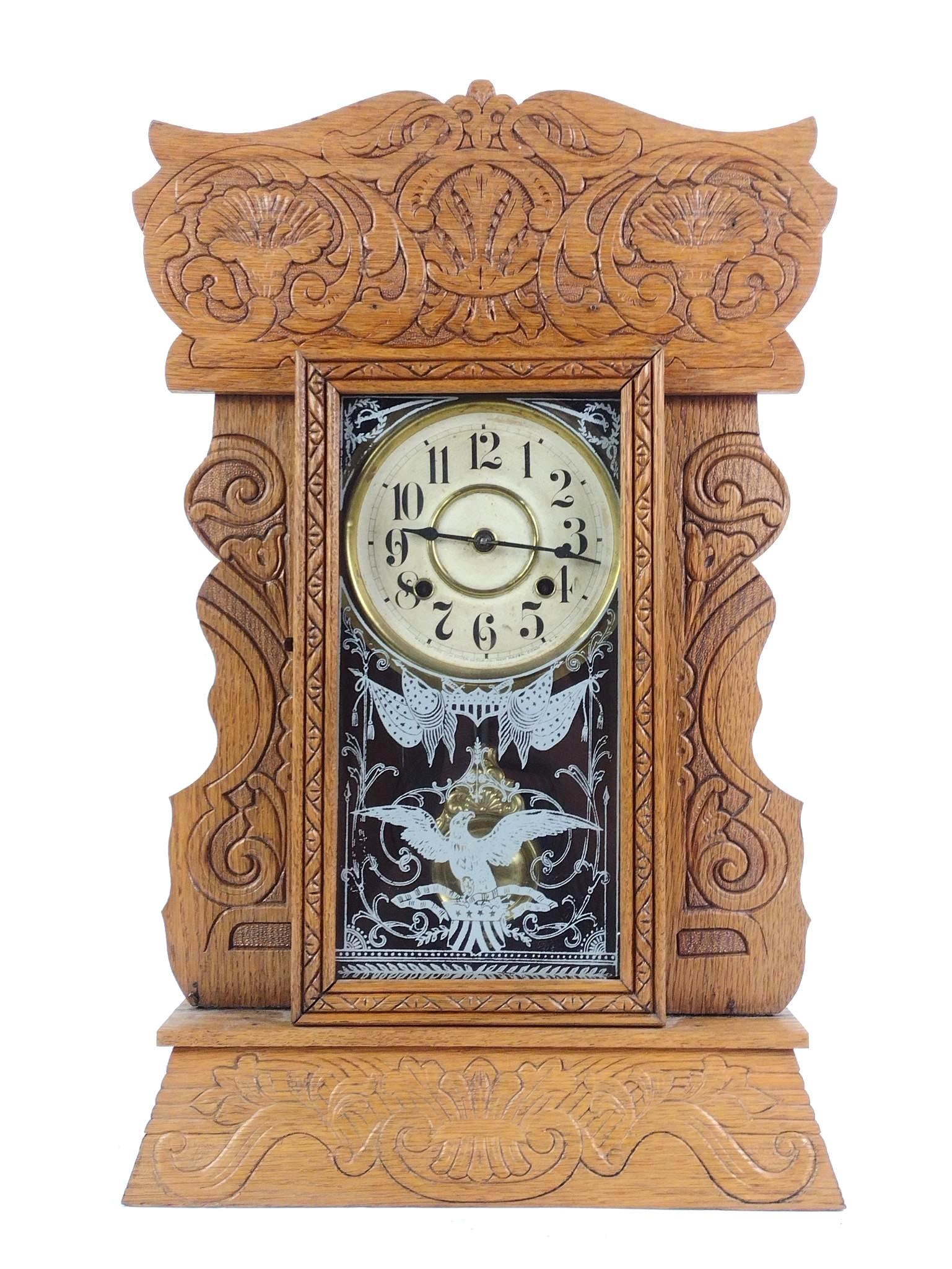 Gingerbread Shelf Clock: Possibly E. Ingraham. Not currently running. 14-3/4" wide x 23-1/4" high.