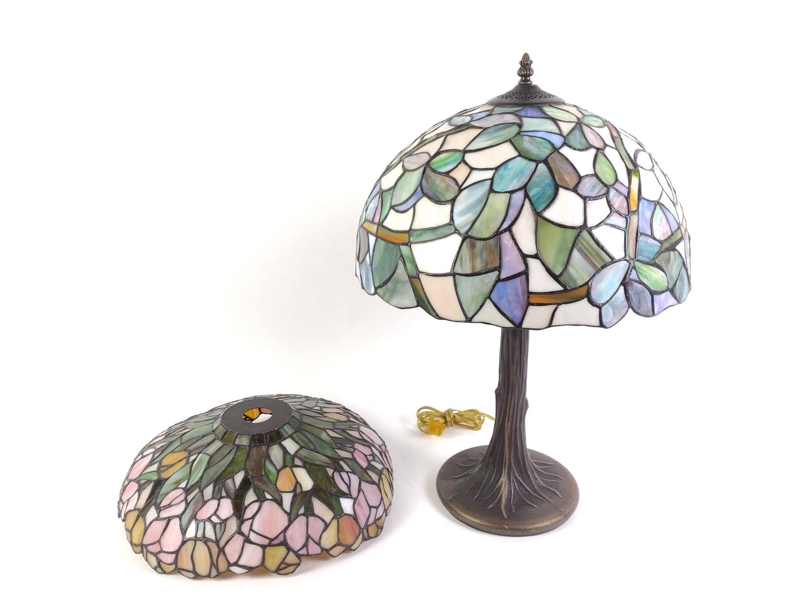 Stained Glass Lamp w/ Extra Shade: NOT ELIGIBLE FOR IN-HOUSE SHIPPING: See Terms for Shipping Options. Lamp overall 16" wide x 25" high. Extra shade measures 15" wide x 4-3/4" high. Cracks to both shades.