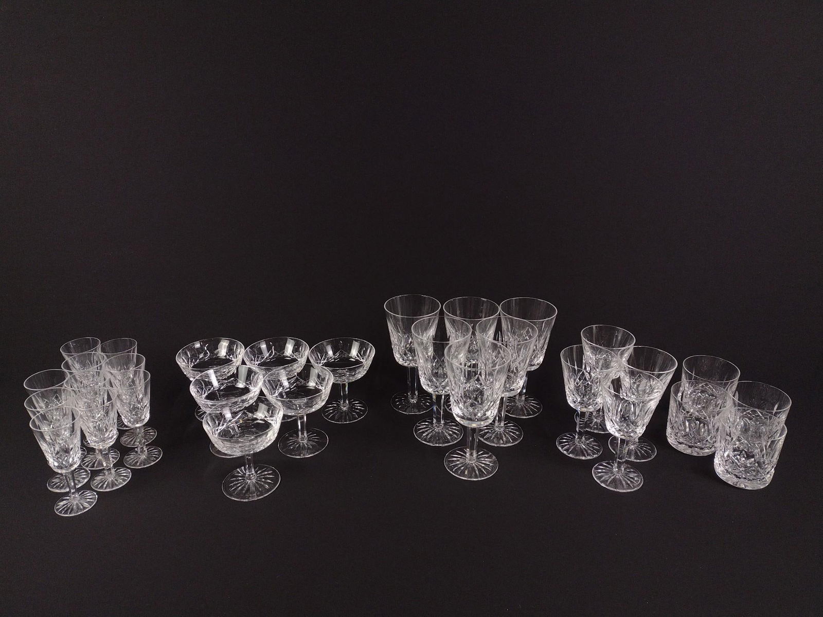 30 Pcs Waterford Stemware: 3-1/4" to 3-1/2" wide x 3-1/4" to 7" high.