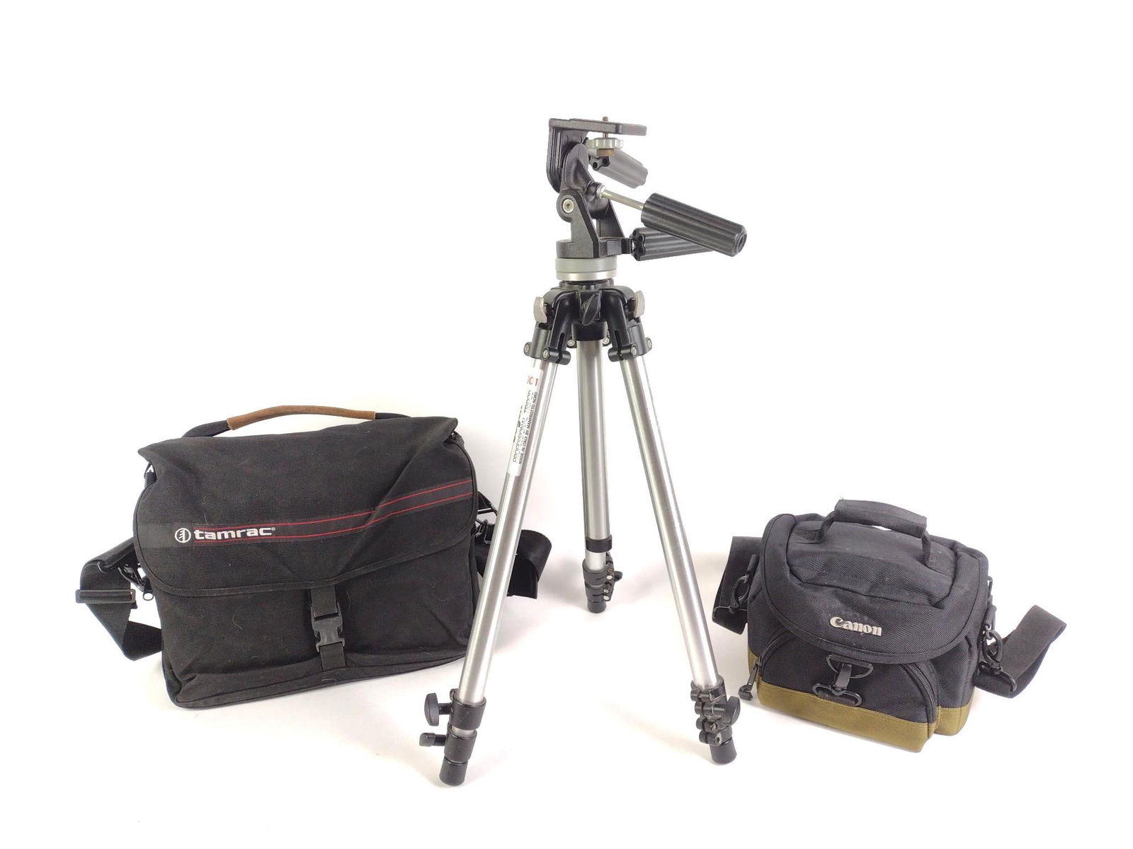 2 Cameras & Accessories: Includes carrying case, lenses, and more. Cameras include Nikon N70 and Nikon D3200.