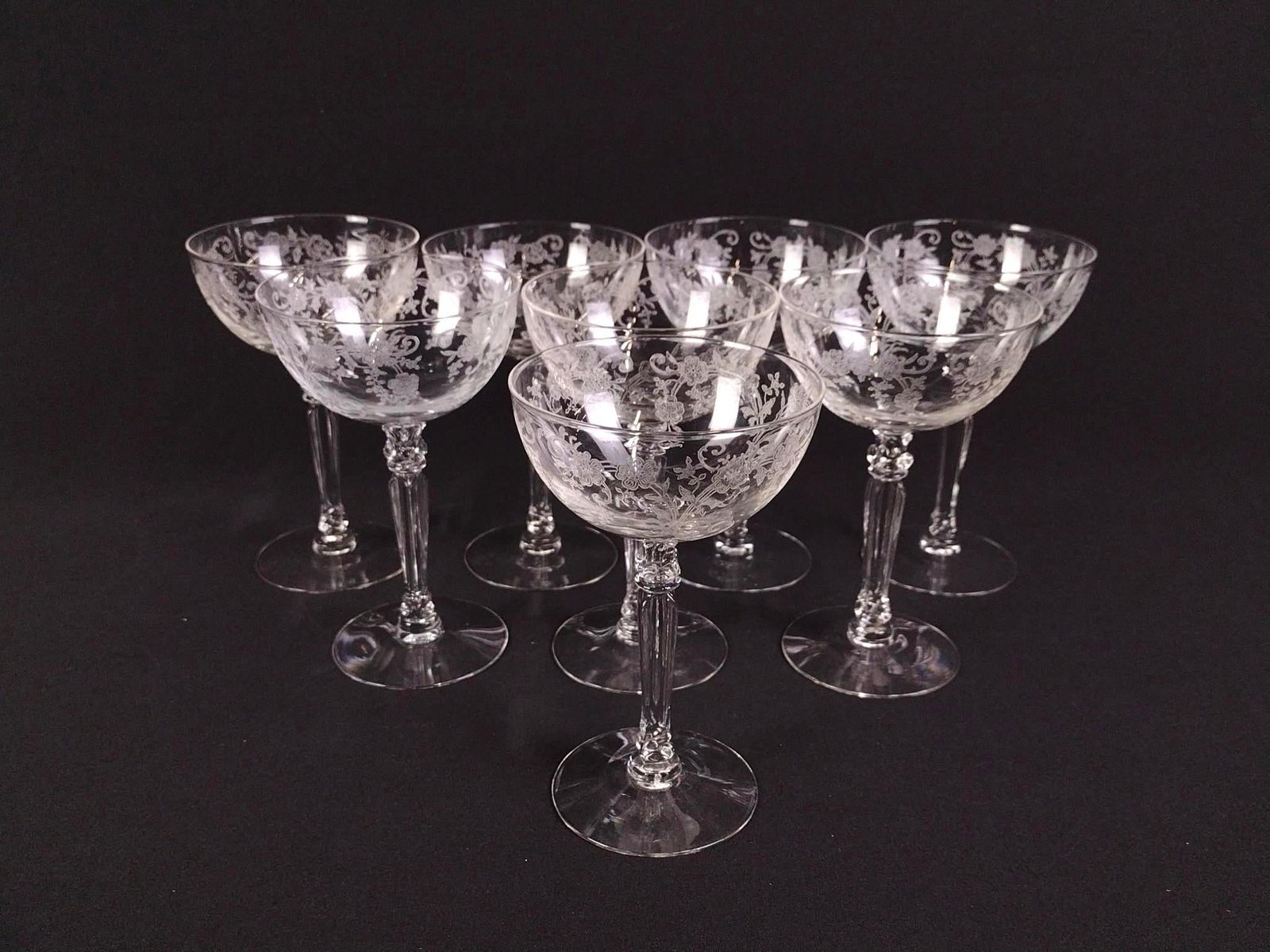 8 Fostoria Etched Glasses: Good condition. All 5-1/2" tall and 3-1/2" in diameter.