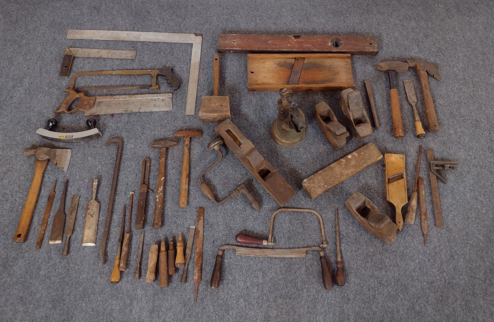 Antique Tools: Includes planners, hammer, and more.