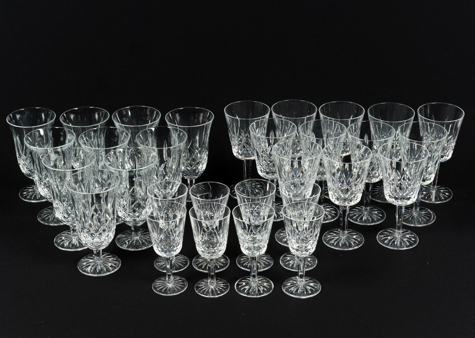 30 Pcs Waterford Stemware: 2-3/4" to 3-1/2" wide x 5-1/2" to 7" high.