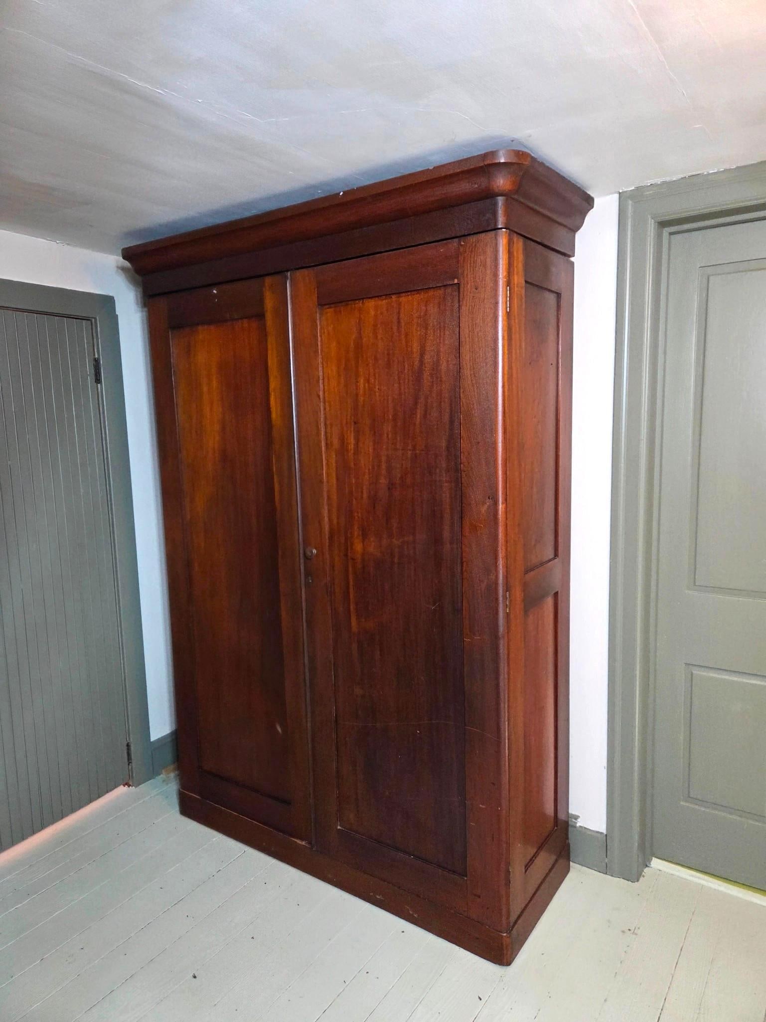 Knockdown Wardrobe: NOT ELIGIBLE FOR IN-HOUSE SHIPPING: See Terms for Shipping Options. To be picked up from location in Dover, PA - located on second floor. 59" wide X 21" deep X 81-1/2" high. Has some scratches.