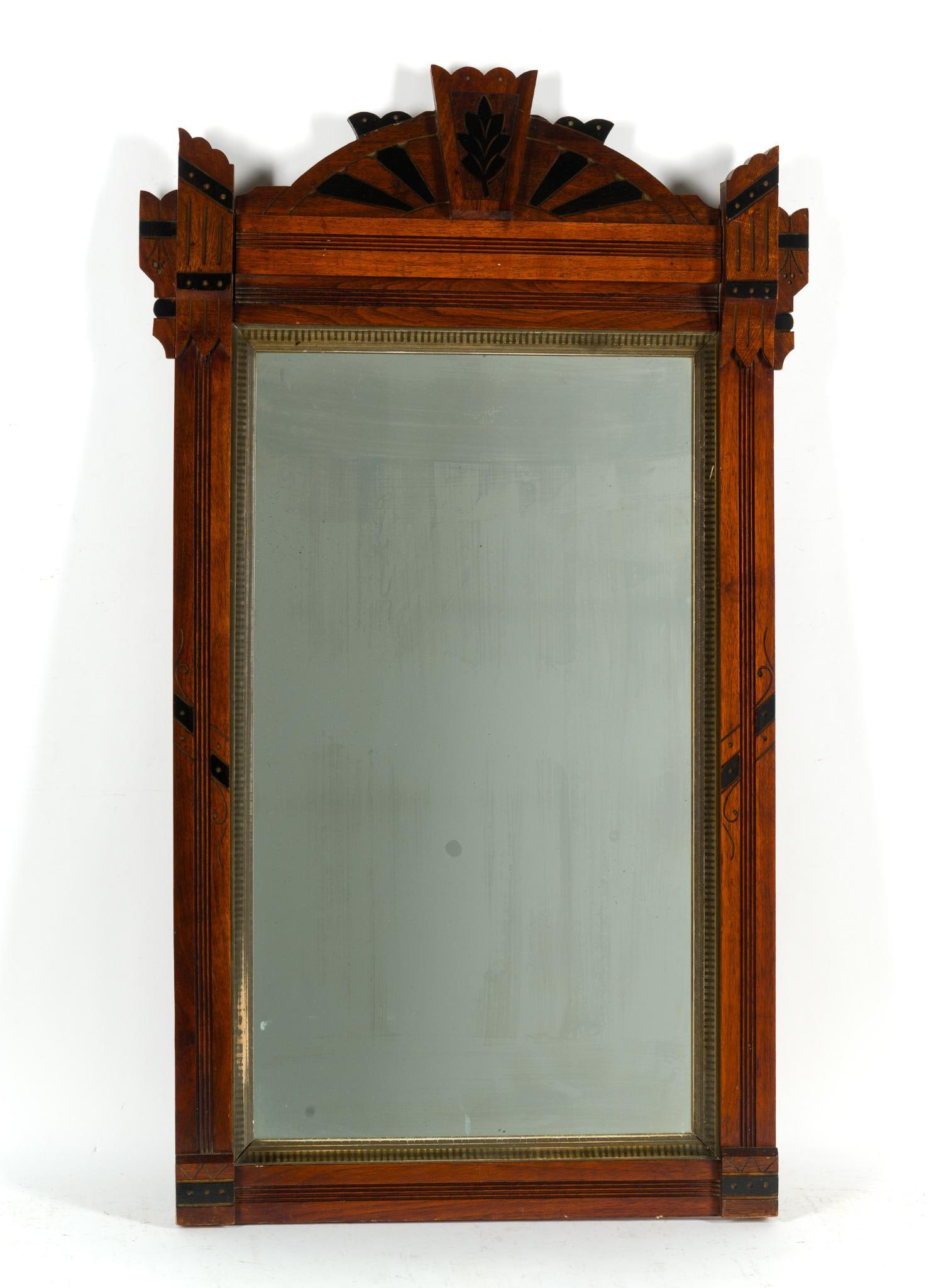 Antique Wood Framed Victorian Eastlake Mirror: NOT ELIGIBLE FOR IN-HOUSE SHIPPING: See Terms for Shipping Options. An Eastlake mirror from the late 1800's with hardwood framing, 40 1/4" X 23 1/2".
