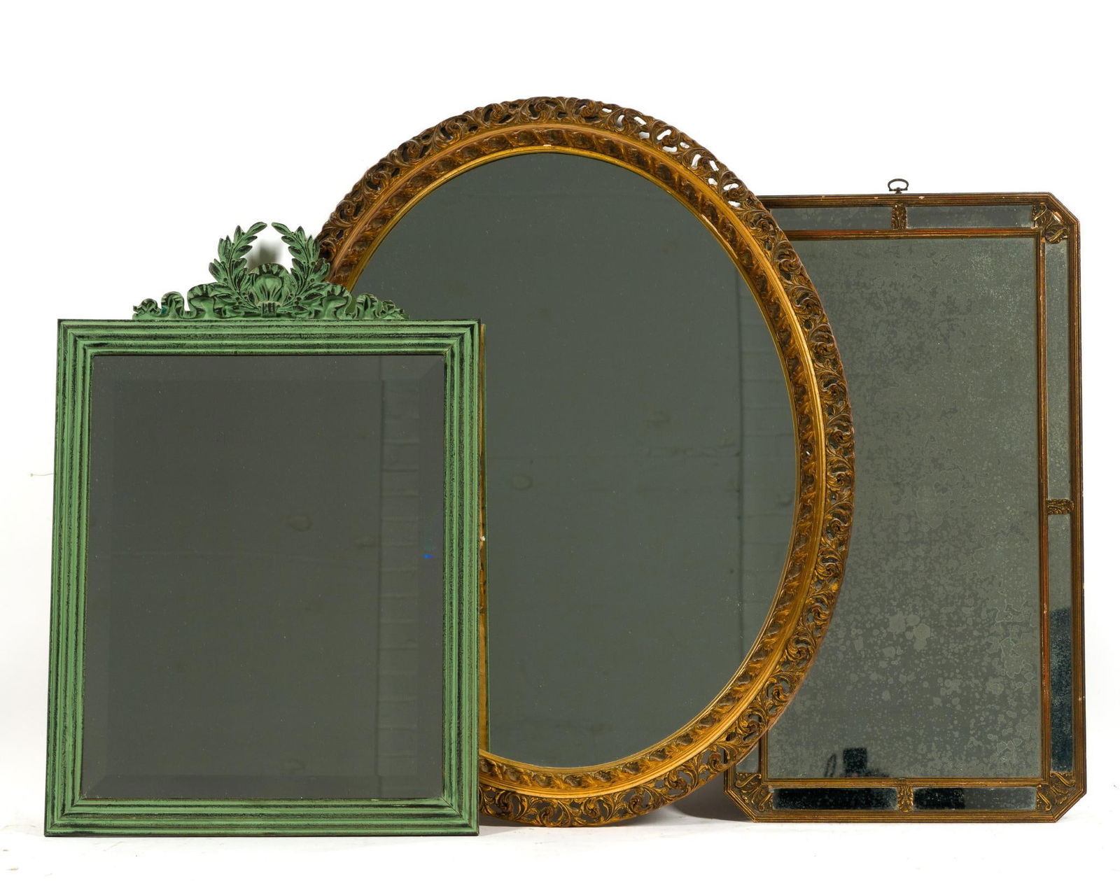 Three Antique Mirrors: NOT ELIGIBLE FOR IN-HOUSE SHIPPING: See Terms for Shipping Options. One mirror with metal framework has age spotting to the back surface of the mirror. Heights range from 27" to 32".
