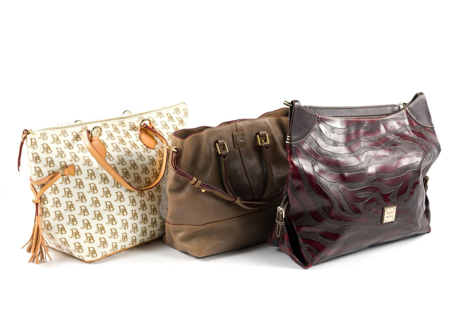 3 Dooney & Bourke Handbags: All in great condition. 17-1/4" to 19-1/2" wide.