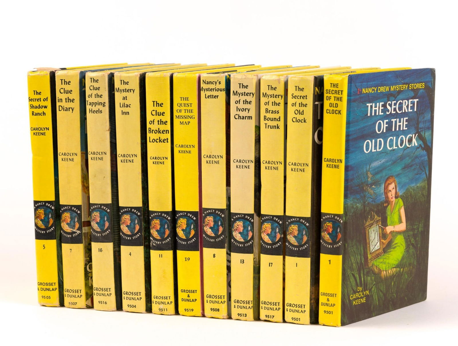 11 Vintage Nancy Drew Books incl. The Quest of the Missing Map: Also includes (2) The Secret of the Old Clock; The Clue of the Tapping Heels; The Mystery of the Ivory Charm; and more.