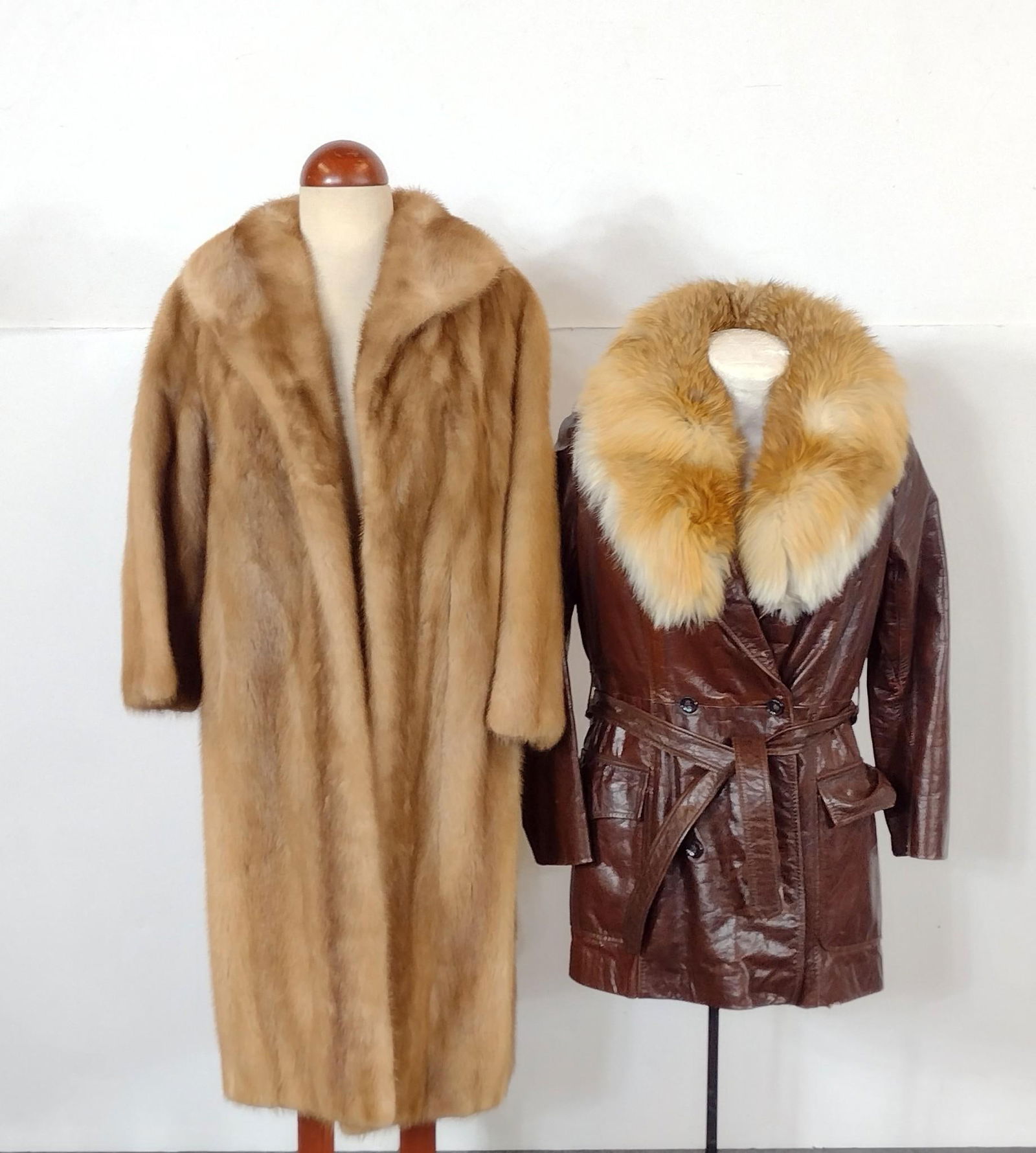 2 Fur Coats: Zinman Furs and Beged-Or. Shoulder to shoulder 16" wide.