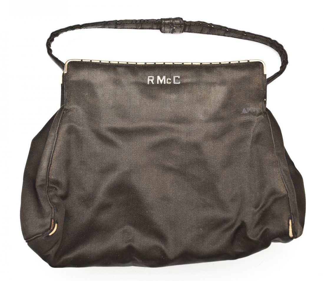 Antique Tiffany & Co. Black Silk Purse: DESCRIPTION: Antique Tiffany & Company black silk purse with gold colored detailing and letters "R Mc C," on the front. Marked "Tiffany & Co.," in interior of clasped pocket. With short strap. MEASURE