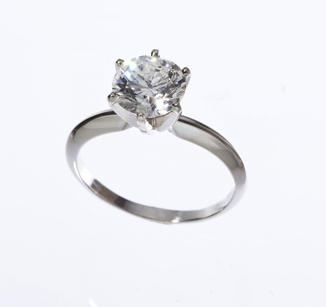 2.36 Carat Diamond Solitaire Ring: DESCRIPTION: Diamond solitaire ring in marked 14K white gold. Set with one GIA certified 2.36 carat round brilliant cut diamond. Clarity I1, color J. Size 8-1/2. 2.4 dwt (3.73 gr). Appraised at $11,39