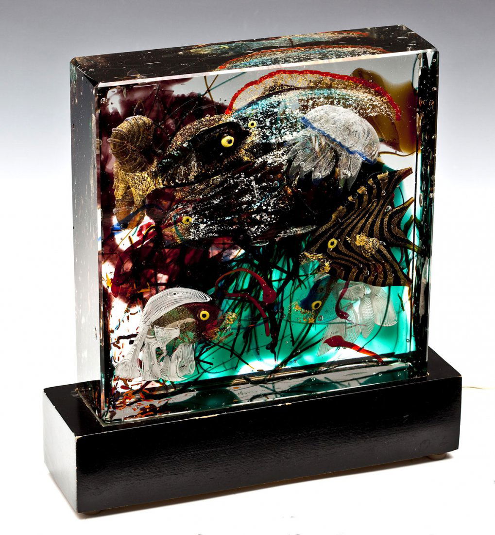 Gino Cenedese Murano Glass Aquarium: DESCRIPTION: Gino Cenedese Murano square glass aquarium. 1972. The clear glass body enclosing tropical fish and jellyfish amidst plants. Marked "Cenedese, Murano 1972," on the bottom. With a black pai