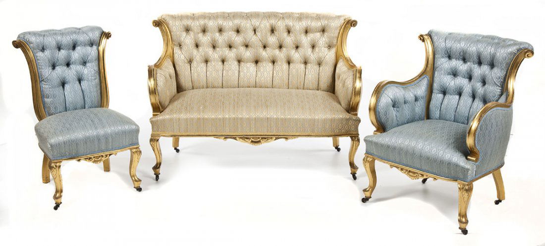 3 Piece French Parlor Suite: DESCRIPTION: Three piece French parlor suite comprising a settee, arm chair and side chair. Each with gilt painted frames and cabriole front legs. With tufted silk upholstery, the settee in yellow and