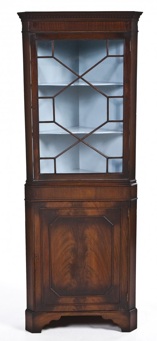 English Two Part Corner Cupboard: DESCRIPTION: English two part corner cupboard. The top with dental molded cornice over mullioned doors opening to reveal two interior shelves. Base with two doors. MEASUREMENTS: 74-1/2" x 27" x 15". C