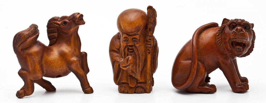 3 Japanese Carved Boxwood Netsukes: DESCRIPTION: Three Japanese figural carved boxwood netsukes. Includes: 1) 2" x 1-7/8" lion. 2) 1-7/8" x 1-7/8" horse, signed. 3) 2" elder. MEASUREMENTS: See Description. CONDITION: No defects noted.
