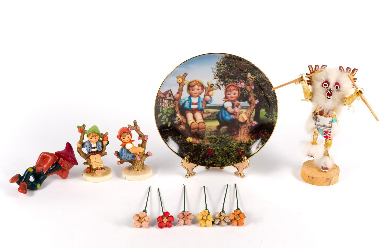 11 Decorative Items incl. Hummels: Also includes handmade flowers, Kachina doll, and reclining hillbilly figurine. 2-1/2" to 4" wide x 4" to 7-3/4" high.