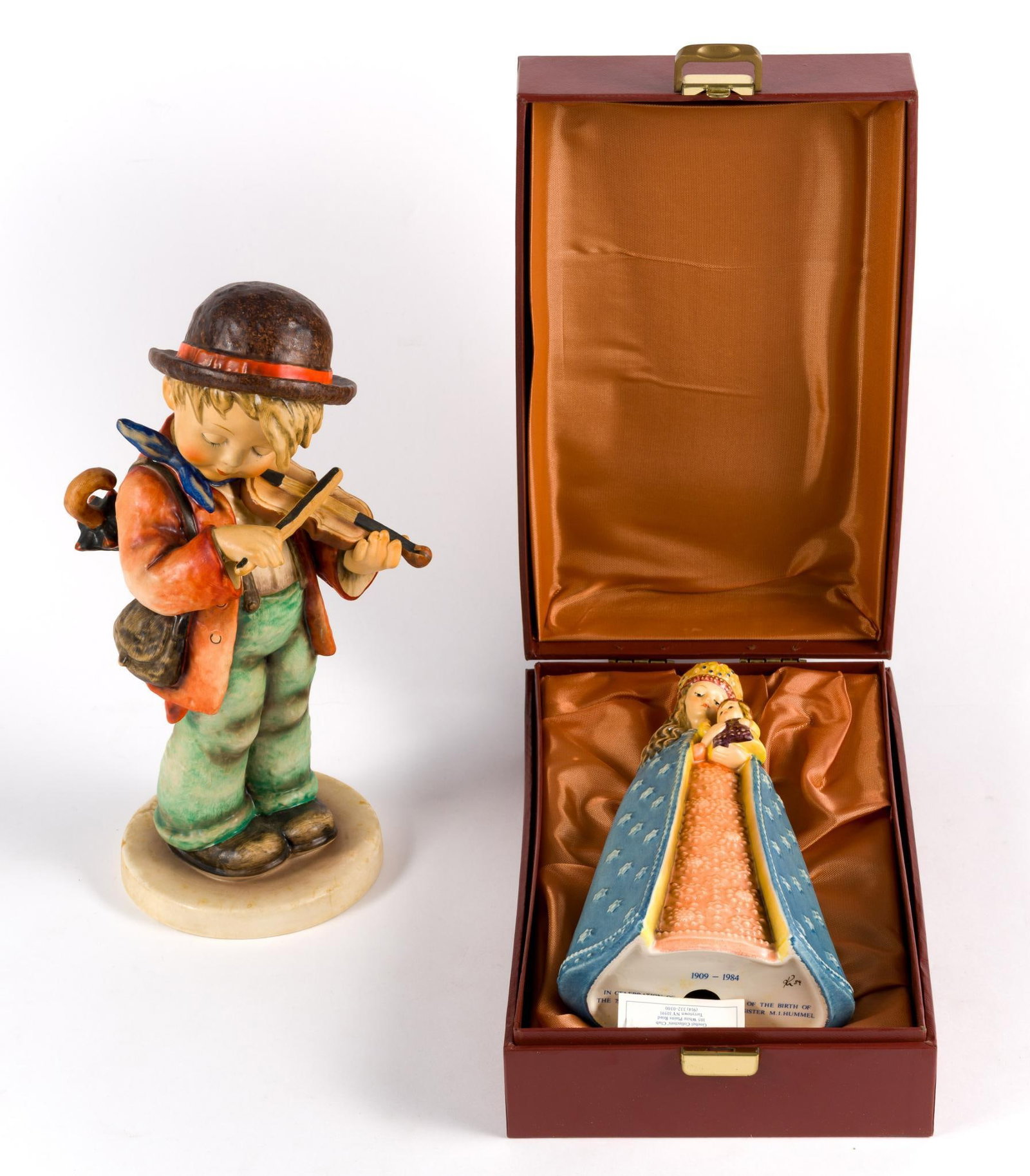 2 Goebel Figurines: Includes 75th Anniversary Sister Maria Innocentia Hummel figurine in OB. 9" to 10-1/2" long.