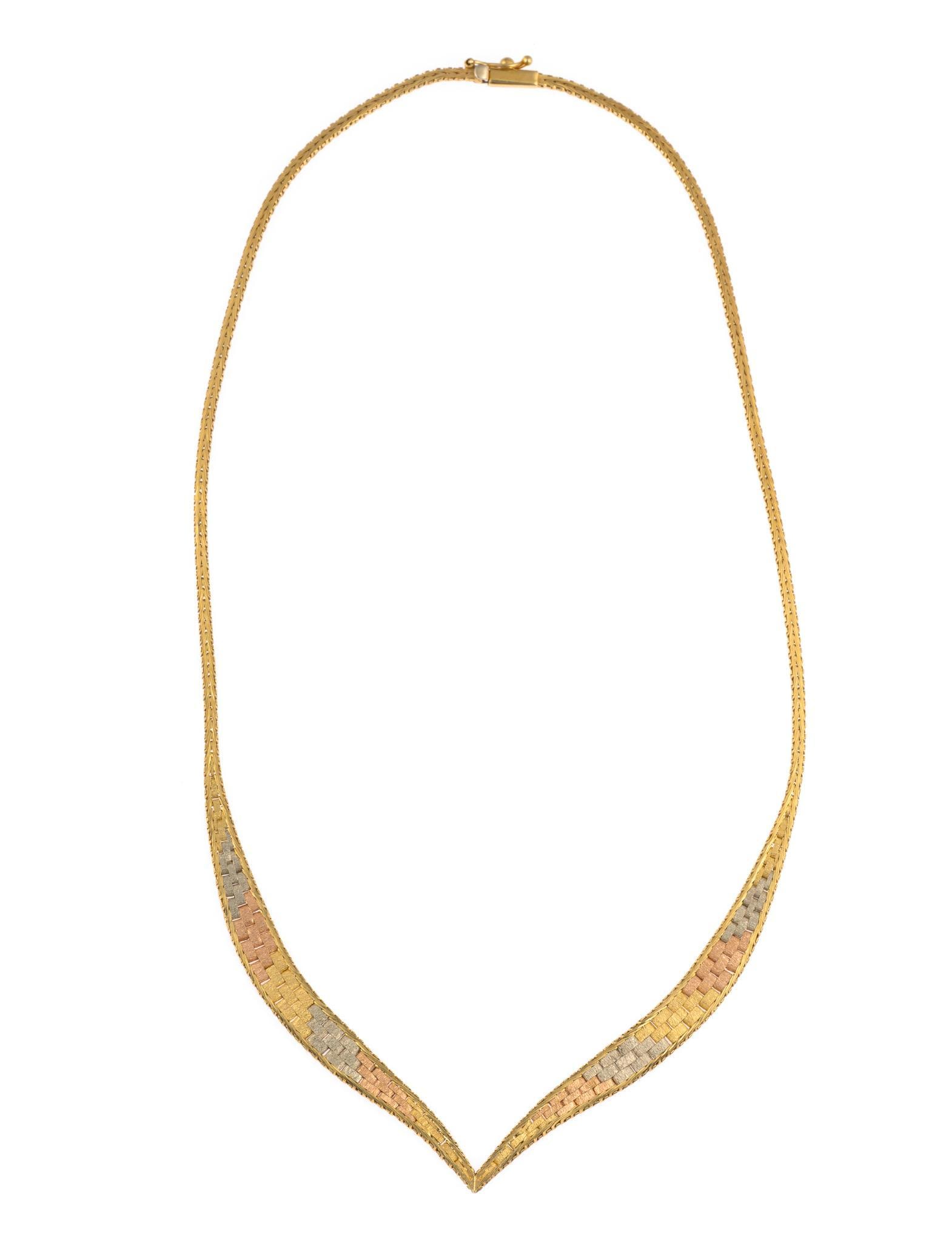 14K Gold Necklace: A choker length necklace in tri-color gold with flexible links. The length is 16" and the weight is 13.0 grams.