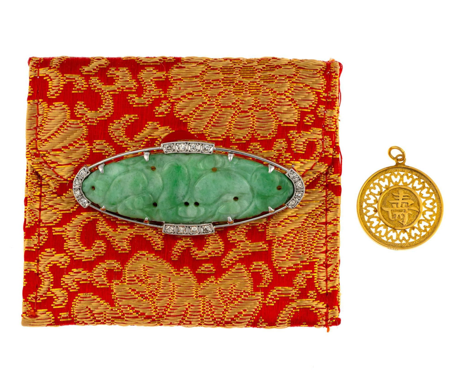 Platinum Jade Brooch and 14K Gold Chinese Pendant: The platinum and carved jade brooch is 2" length with small diamonds, 10.3 grams. The pendant is 14k yellow gold with weight of 1.5 grams.