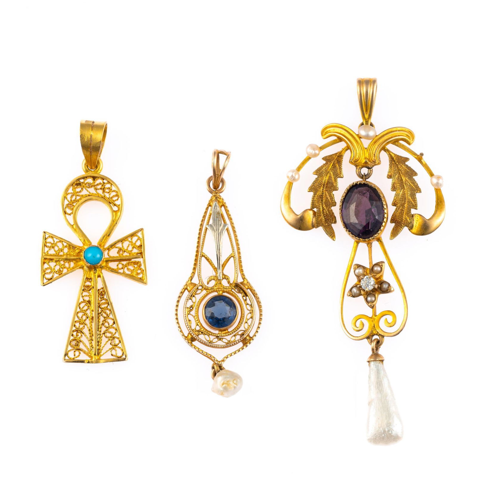 3 Antique Gold Pendants: One with fresh water pearl and sapphire testing 10k with weight of 1.2 grams. One with garnet, mother of pearl, and a small diamond tests 14k with weight of 2.6 grams. One, a cross with arabic gold