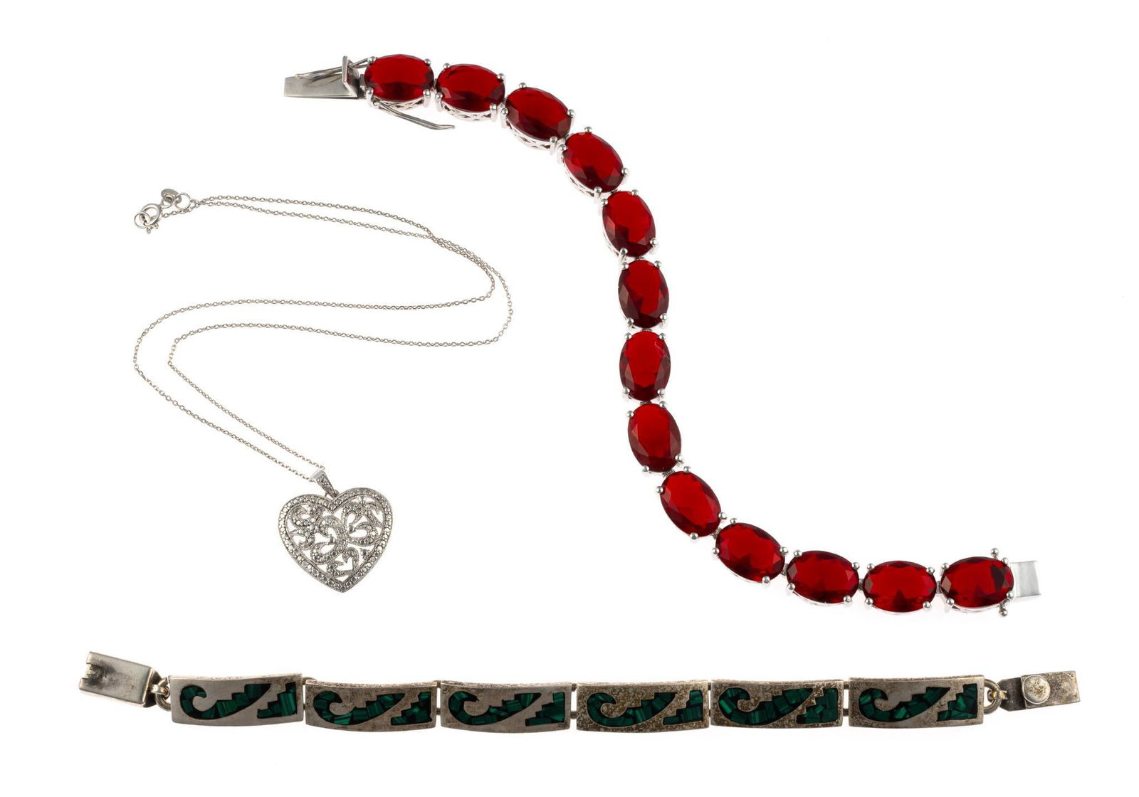 Two Sterling Silver Bracelets and Necklace: The necklace is a 16" sterling chain with a 3/4" heart pendant. One bracelet 7 1/2" with gemstones and the second 7" with inlaid malachite. Total weight is 2.3 troy ounces.