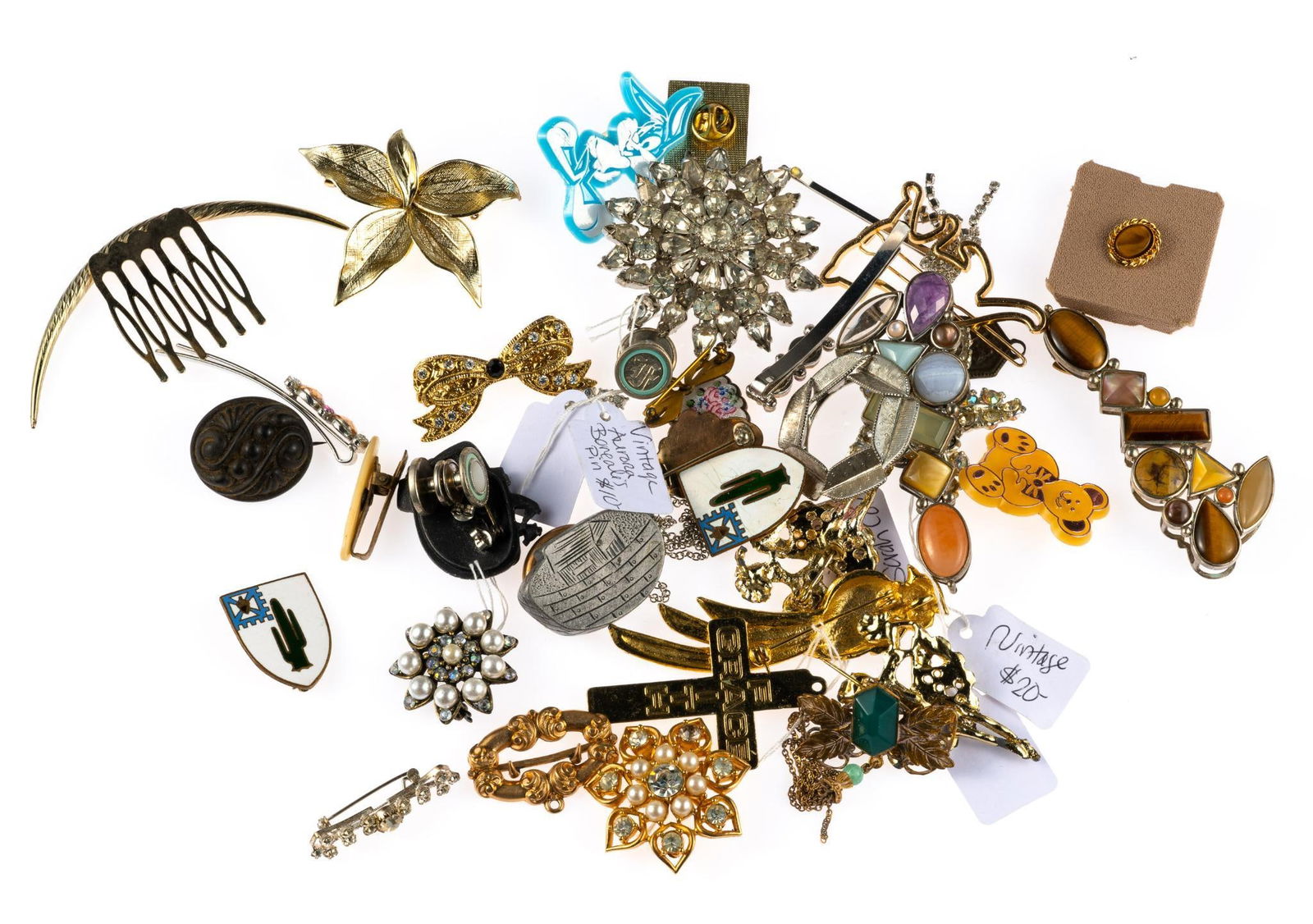 Vintage and Costume Jewelry: Includes brooches, hair pieces, and more.