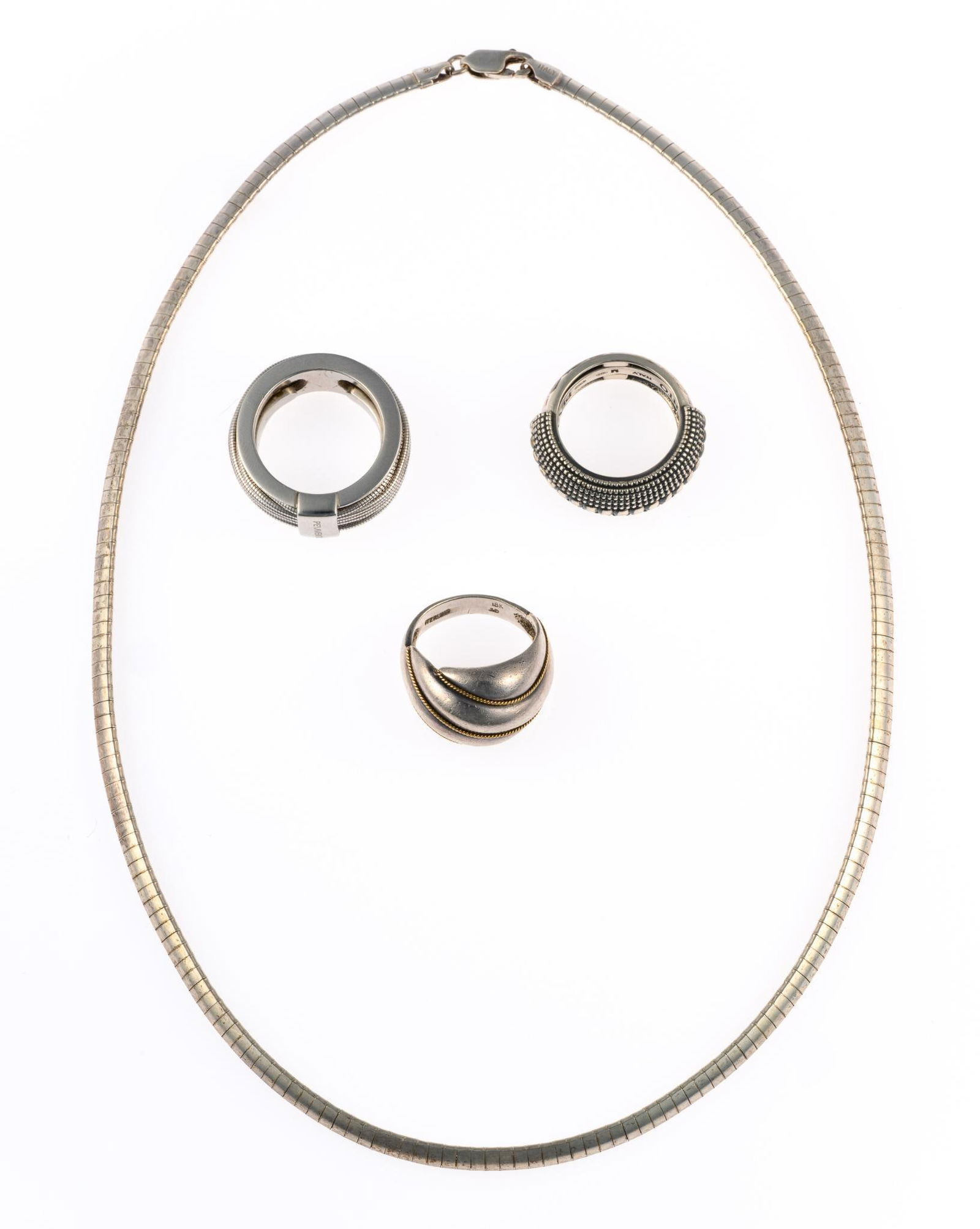 Sterling Silver Chain and Rings incl Pesavento: One ring size 6.5 in sterling silver with 18k gold details (8.2 grams weight). Two rings size 7.5 to 8 dated 1979 by Pesavento. One omega chain necklace 18" length. Weight of sterling silver is 1.6