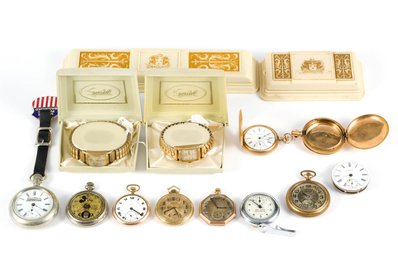 Ten Pocket Watches Parts and More: A variety of pocket watches including five gold filled pocket watches or cases. Included are a 14k gold filled 20 year Keystone hunter case empty with weight of 68.7 grams, a Waltham 1903 size 12s