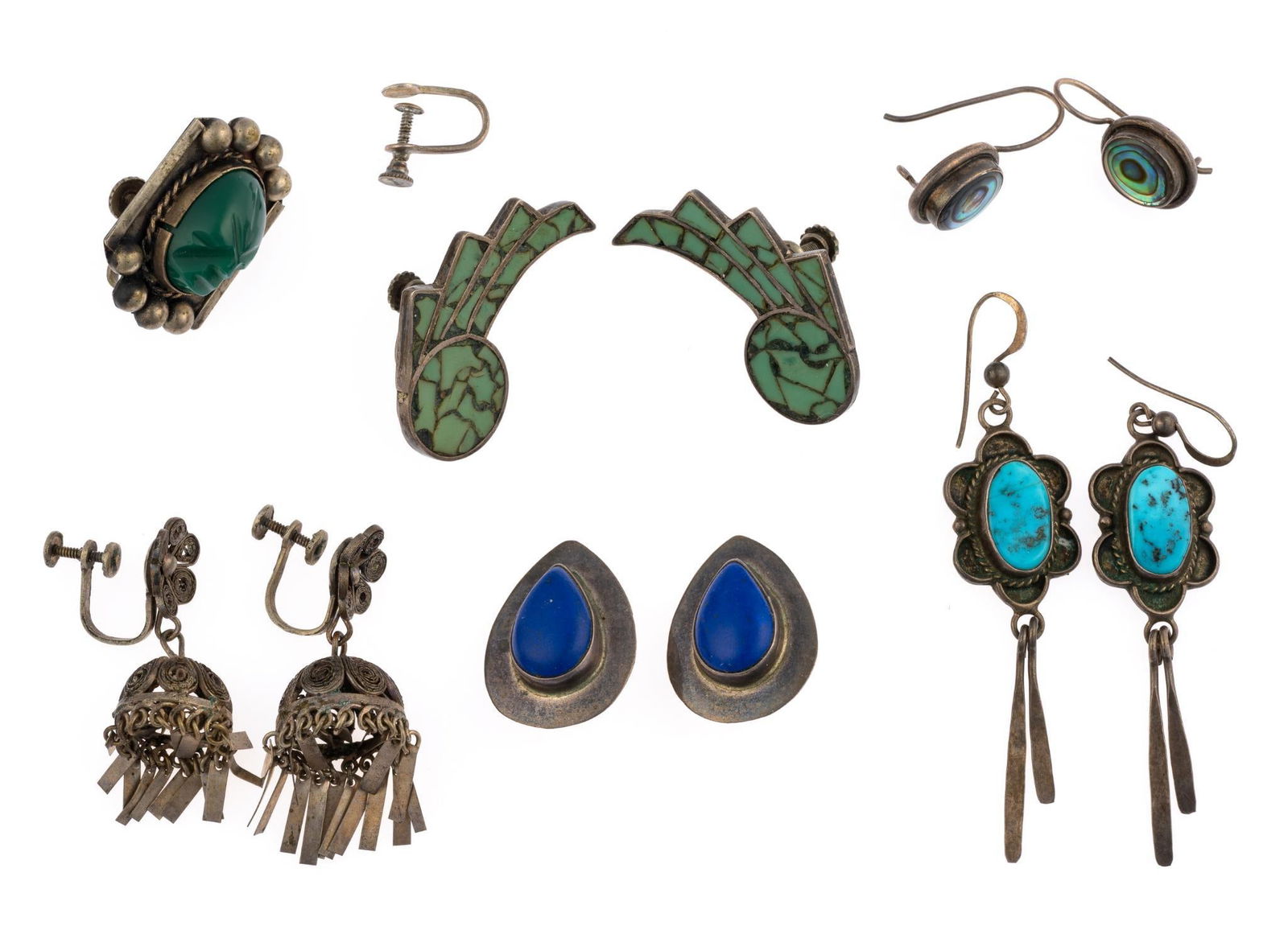 11 Sterling Silver Earrings: Five pairs and two unmatched. All marked. 3/4" to 1-1/2" long. 1.23 ozt total.