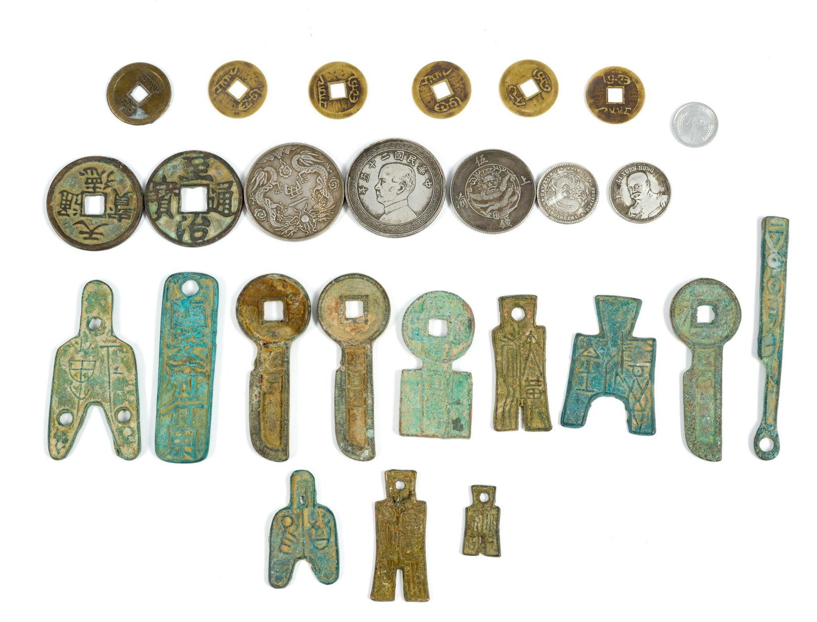 Bronze Chinese Money Pieces: 1" to 1-1/4" wide x 1" to 2-1/4" long.