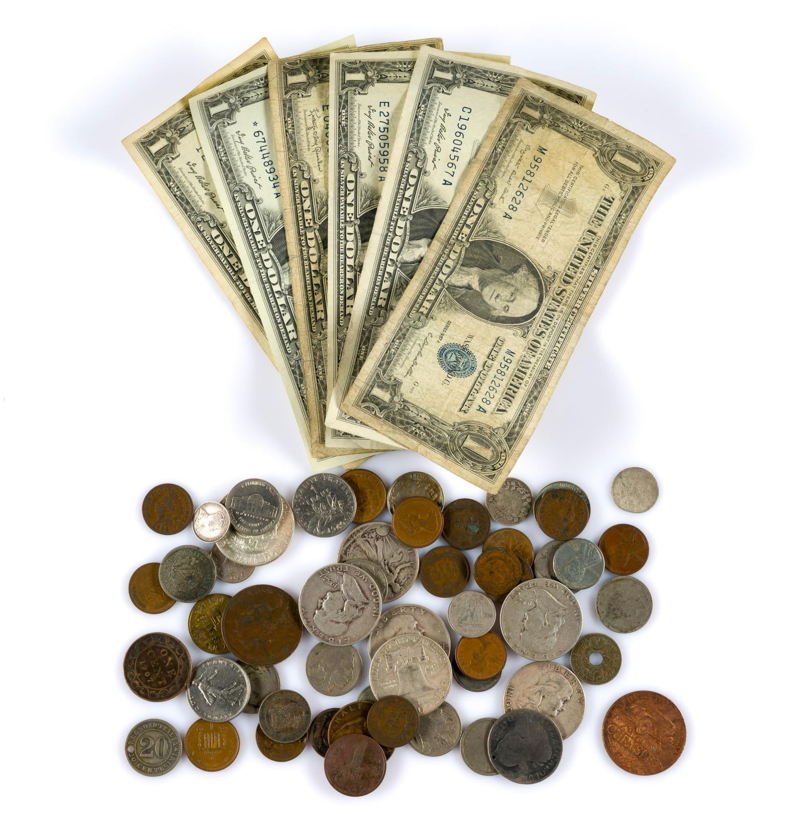 Various World Coins and U.S. Silver Half Dollars Silver Certificates: Six silver certificate one dollar bills 1957, seven silver half dollars, several Buffalo and Liberty nickels, several Wheat and Indian Head cents, world coins including some silver.