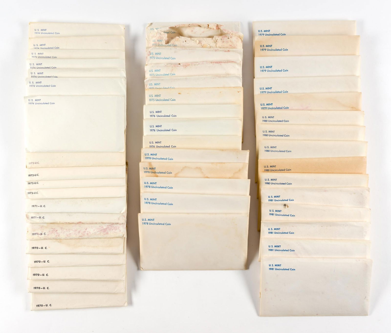 Forty Eight 1970's and 1980's United States Mint Sets Including Silver: The 48 sets range from 1970 through 1981. The five 1970 sets contain 40% silver Kennedy half dollars. Some of the paper envelopes are degraded.