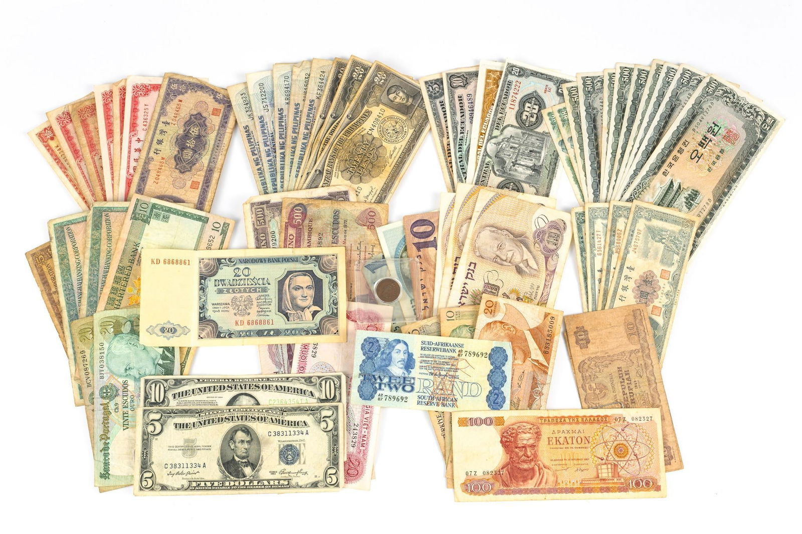 World And U.S. Currency Silver Certificate: 1934 $10 Federal Reserve note and 1953 $5 Silver Certificate. Various world bills including Hong Kong, Philippines, Ecuador.