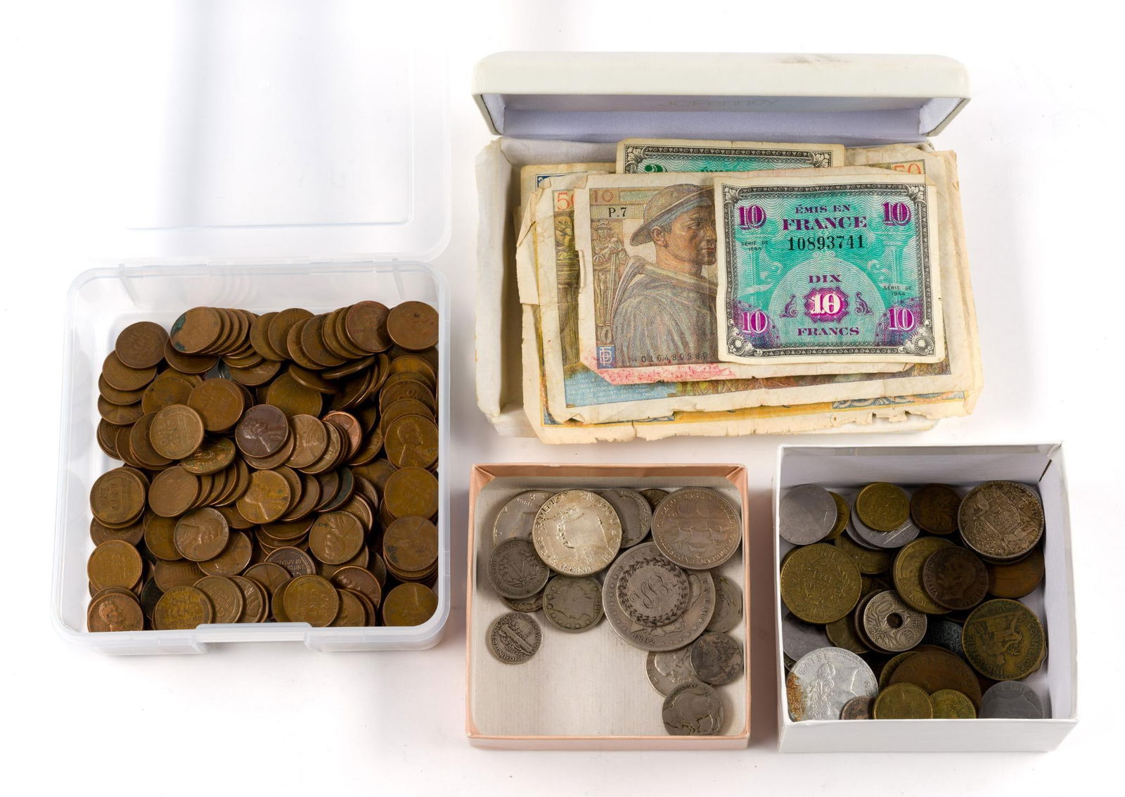 Mixed U.S. And World Coins With Silver.The: The U.S. coins include an 1892 Morgan dollar with heavy wear, an 1893 Columbian half dollar commemorative, three other silver halves of which one is 40% silver Kennedy. A few silver quarters and
