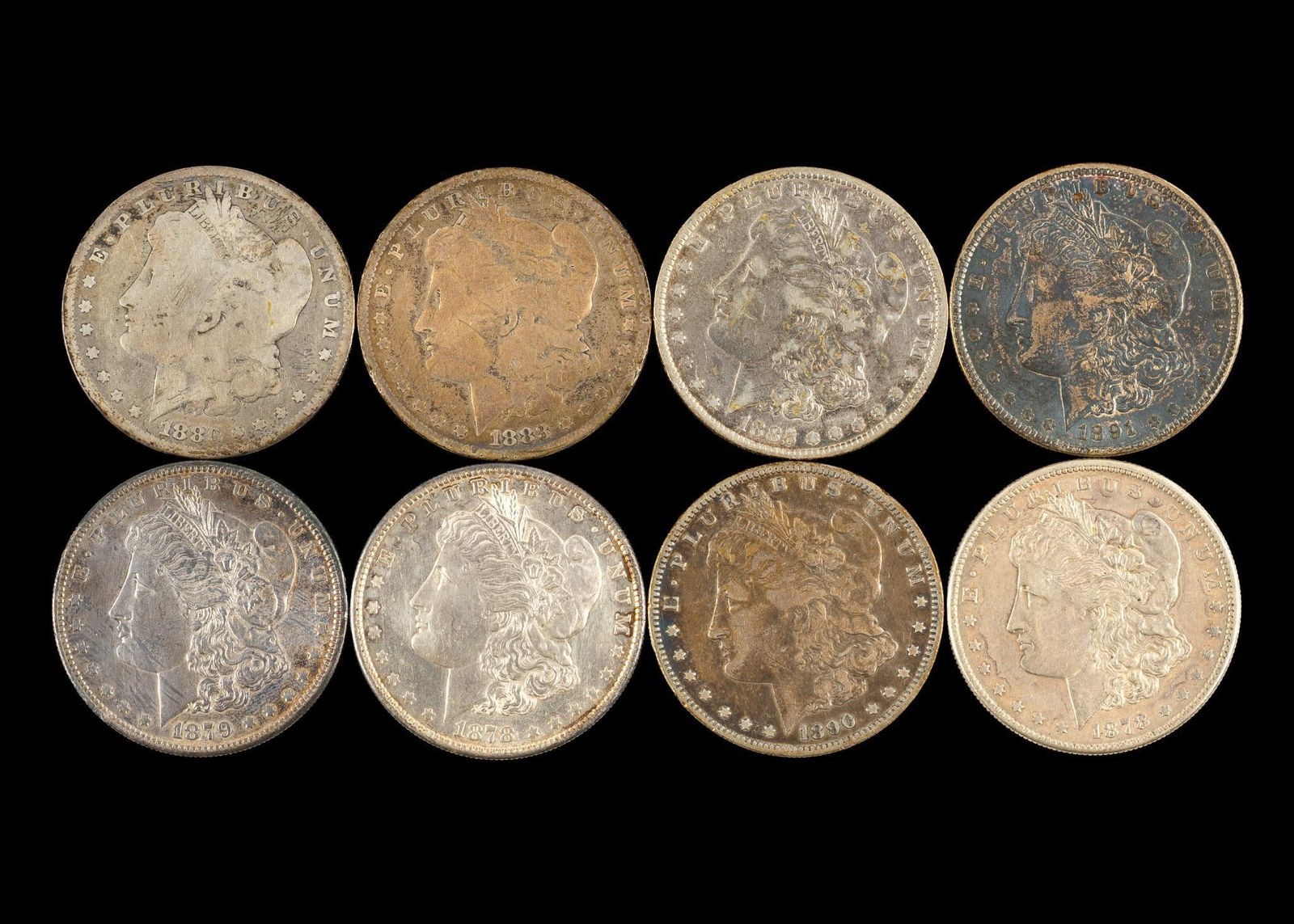 Eight Morgan Silver Dollars (1 of 2)