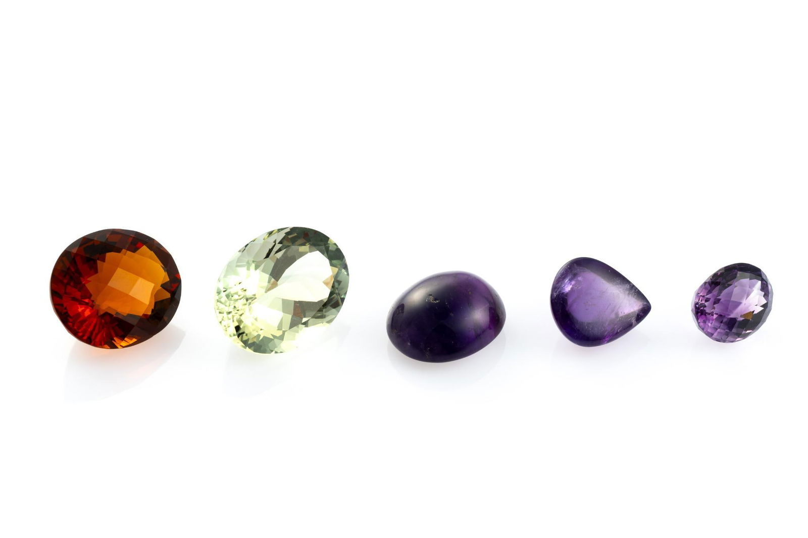 Five Large Gemstones incl Amethyst and Citrine: 34 carat light green amethyst oval cut, Brazil. 11.66 carat oval cut amethyst, Africa. 33.75 carat oval checker cut citrine, Africa. 12.52 carat pear cabochon, CC purple raspberry, Africa. 22.65