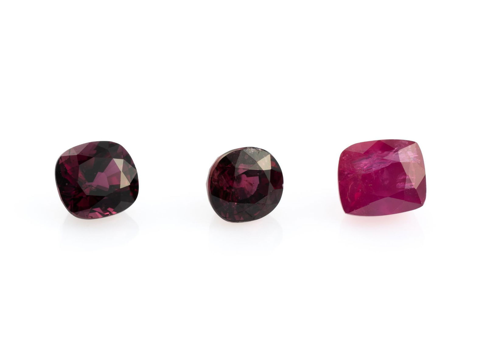 Three Ruby Gemstones: Loose 1.75 carat top red antique facet cut ruby, with the Burapha Gemological Laboratory report stating untreated. 1.70 carats cushion/mixed cut ruby, with the Burapha Gemological Laboratory report st