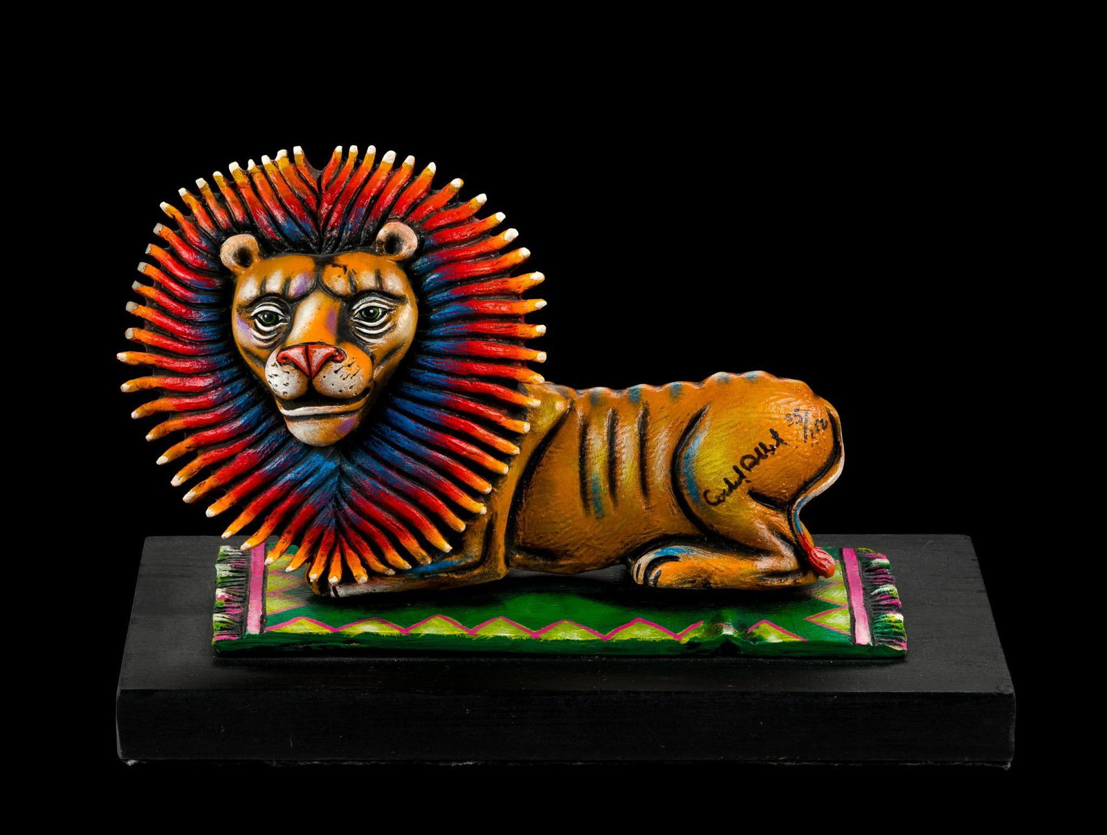 Carlos & Albert Lion Sculpture: A sculpture by Carlos Munoz and Albert Ickenroth depicting a lion. The height is 6" and the base is 9 1/4" by 5". Number 35 of 150.