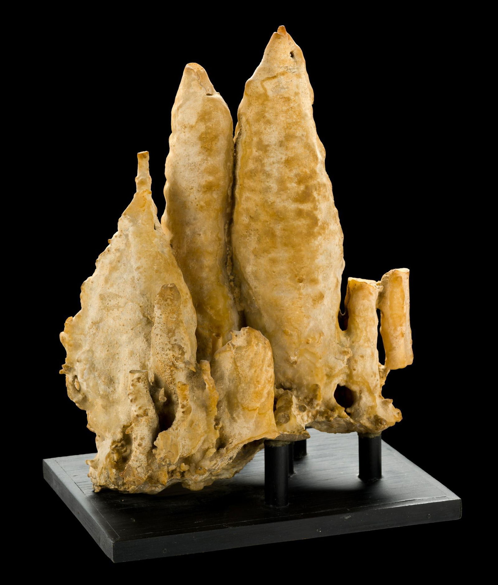 Stalactite Mineral Specimen: A 10" height by 8" by 5 1/2" stalactite. The size does not include the base.
