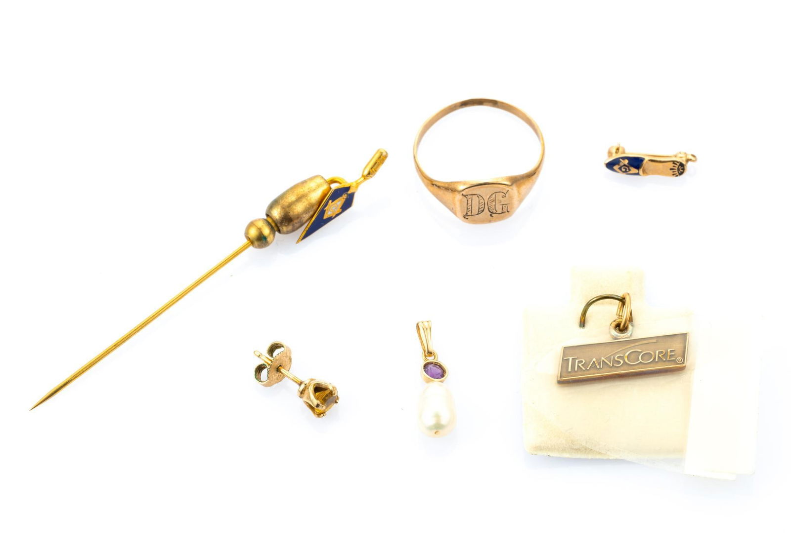 14K and 10K Gold Jewelry: Various jewelry items including a 10k monogram ring. 14k gold including the pearl weighs 1.3 grams. 10k jewelry weighs 4.9 grams. The earring is gold filled and not weighed.