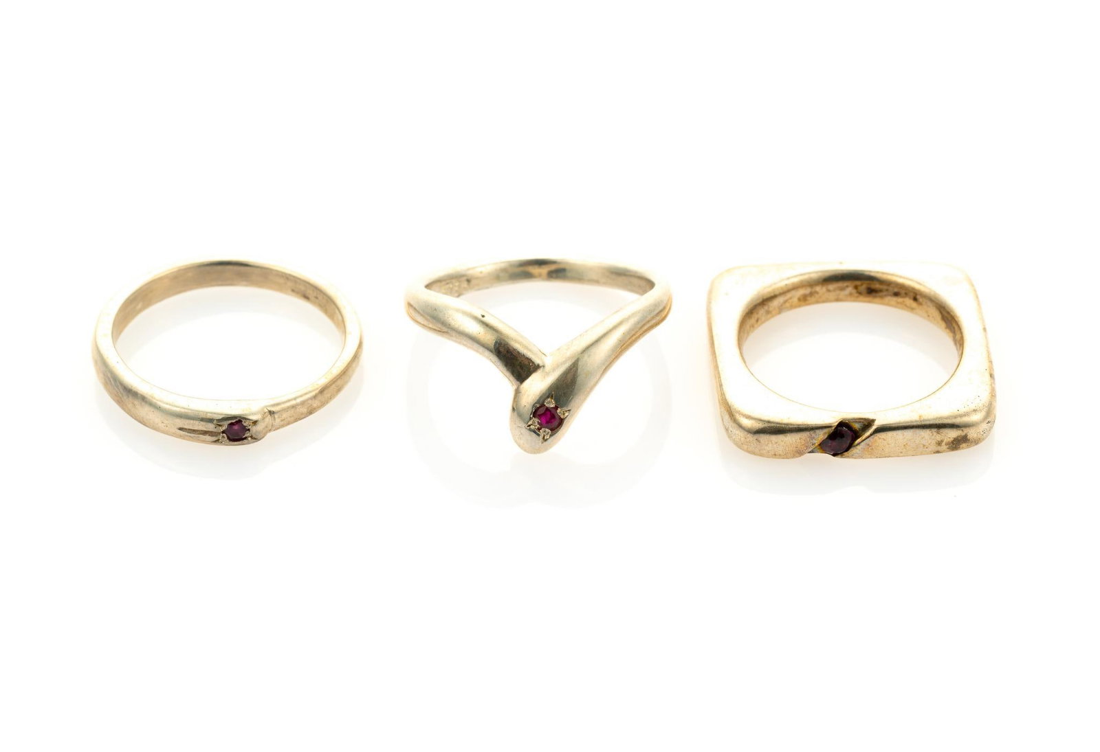 3 Sterling Silver & Ruby Rings: All round brilliant cut, heated rubies. One VS clarity and two SI clarity. Ring sizes 5.5 to 6.5. Total 0.38 ozt. Gemstones include Amethyst & 2 Rhodolite. Amethyst is purple, round brilliant cut, nat