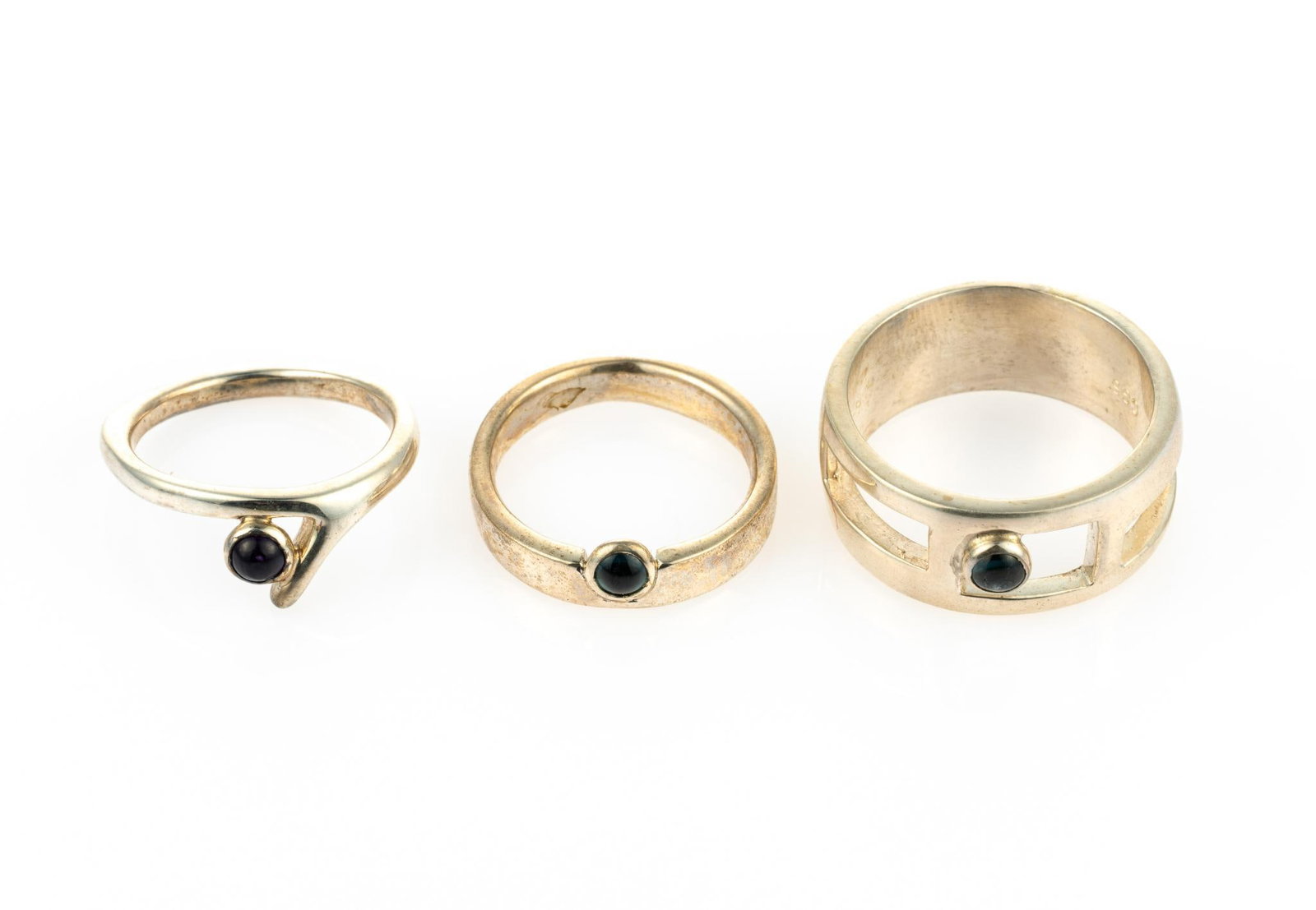 3 Sterling Silver & Gemstone Rings: Includes amethyst round cut, natural; and two tourmaline round cut, natural. Ring sizes 6.5 to 10. Total 0.47 ozt. Gemstones include Amethyst & 2 Rhodolite. Amethyst is purple, round brilliant cut, na