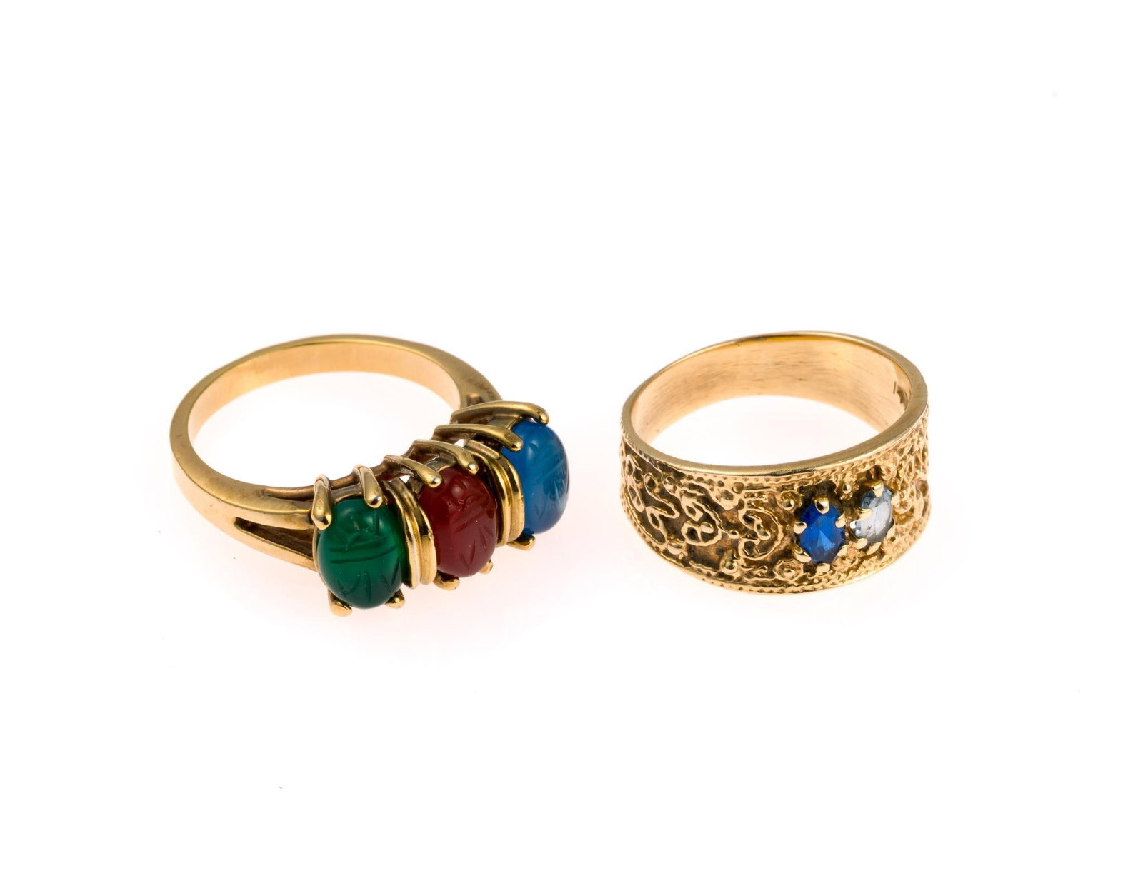 14K Gold Gemstone Ring and Scarab Ring: A size 7 yellow gold ring with birthstones, a mother's ring, with aquamarine and sapphire. Also a size 7 non-gold (gold plated) ring with scarab carved gemstones. The 14k gold ring weighs 4.7 grams.